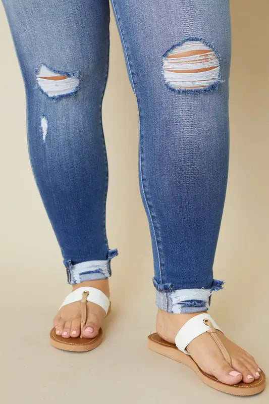 Plus High Rise Button Skinny Jeans